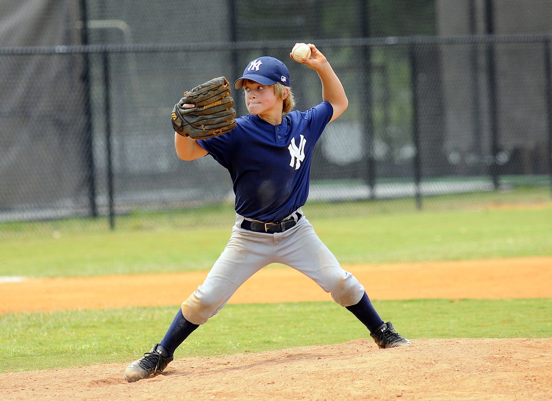 Pitcher Collin Goda, 10, hit a grand slam for the New York Yankees.