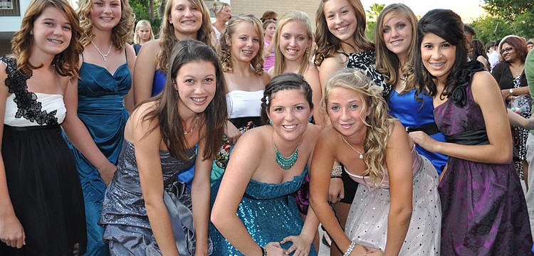 Students gathered outside for the announcement of eighth-grade notables before the dance.