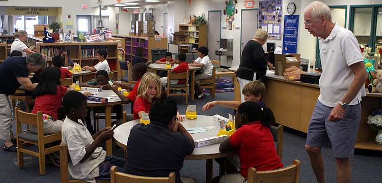 The students of Gocio Elementary School's bridge club play a few hands of bridge during their final meeting Monday, May 23 inside Gocico Elementary School's Media Center.