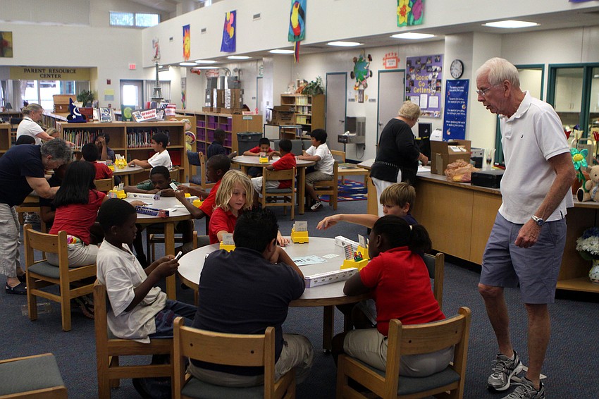 The students of Gocio Elementary School's bridge club play a few hands of bridge during their final meeting Monday, May 23 inside Gocico Elementary School's Media Center.