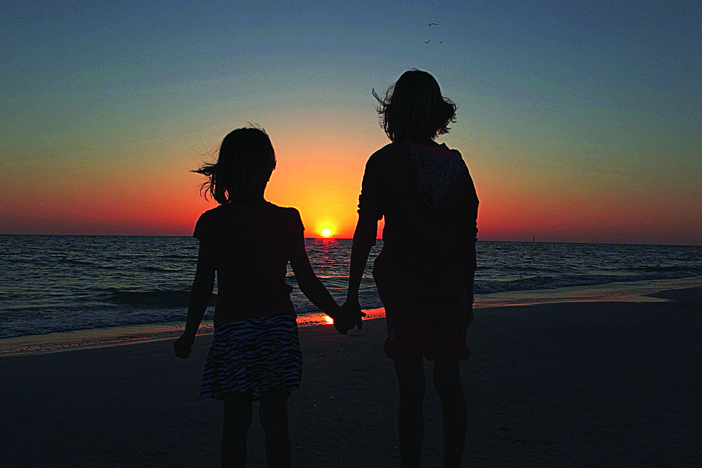 Wayne Magee submitted this sunset photo of his granddaughters, taken on Siesta Key.