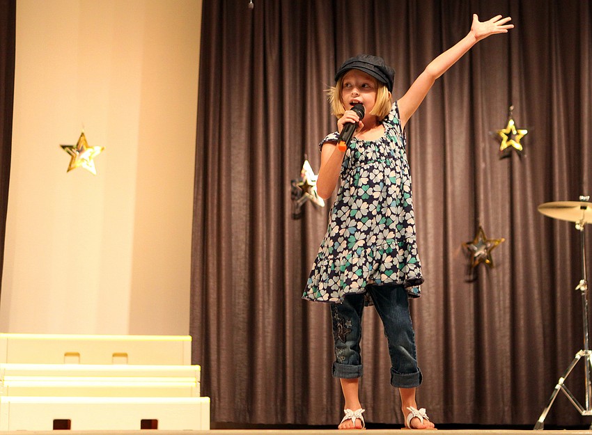 Kennedy Cameron, 2nd grade, worked the stage as she sang 