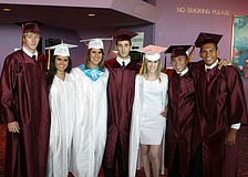 Stephen Hueston, Alyssa Nutter, Lauren Kennedy, Andrew Interial, Taylor Keenan, Jason Rosales and Jereme Johnston pose together while they wait down stairs prior to graduating Friday, May 27 at the Van Wezel.