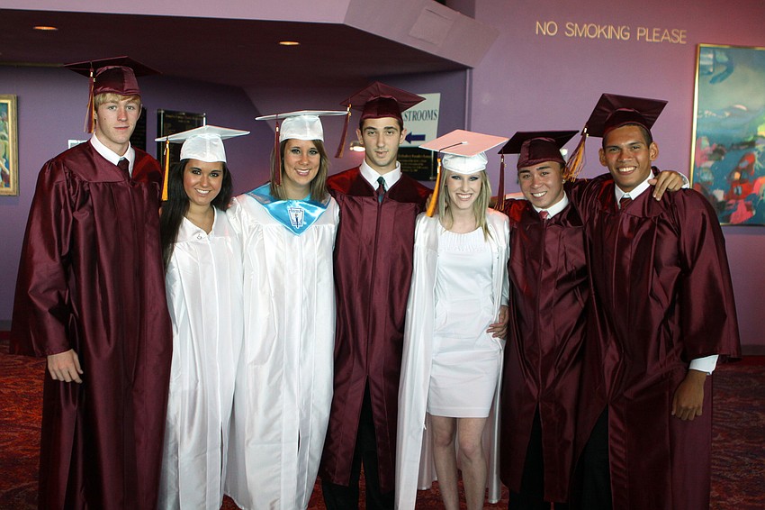 Stephen Hueston, Alyssa Nutter, Lauren Kennedy, Andrew Interial, Taylor Keenan, Jason Rosales and Jereme Johnston pose together while they wait down stairs prior to graduating Friday, May 27 at the Van Wezel.