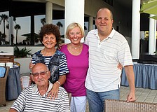Barbara Pressman, Bob Berns, Bonnie Zeamon and Douglas Pressman pose together at the Longboat Key Club's BBQ and Movie night Saturday, May 28 at the Longboat Key Club hotel poolside.