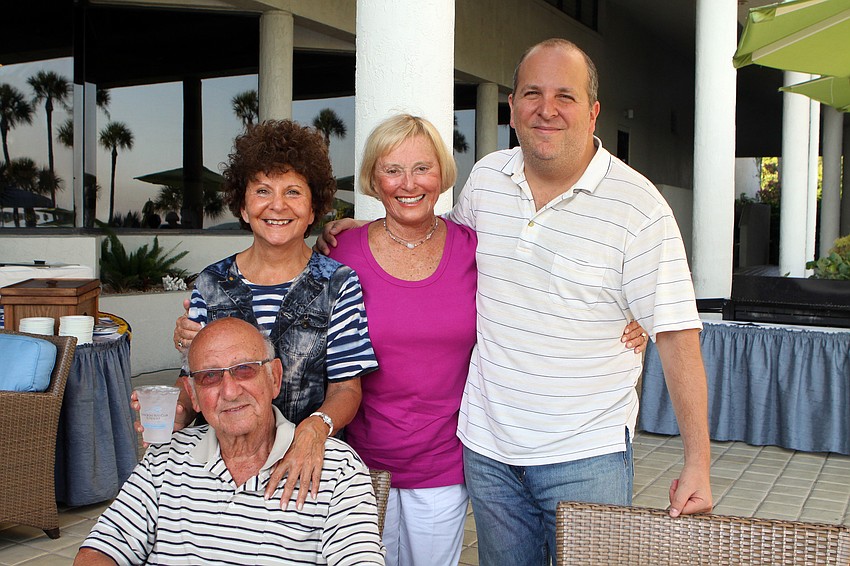 Barbara Pressman, Bob Berns, Bonnie Zeamon and Douglas Pressman pose together at the Longboat Key Club's BBQ and Movie night Saturday, May 28 at the Longboat Key Club hotel poolside.