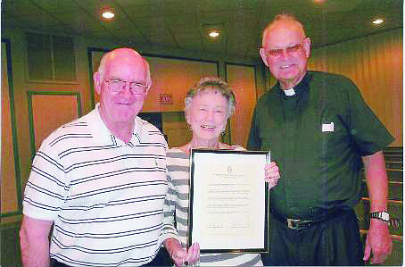 Msgr. Gerry Finegan, Rita Stormes and the Rev. Edward Pick