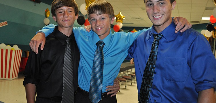 Eduardo Ronderos, Jamie Jeffcoat and Kyle Kimpton had fun mingling with friends.