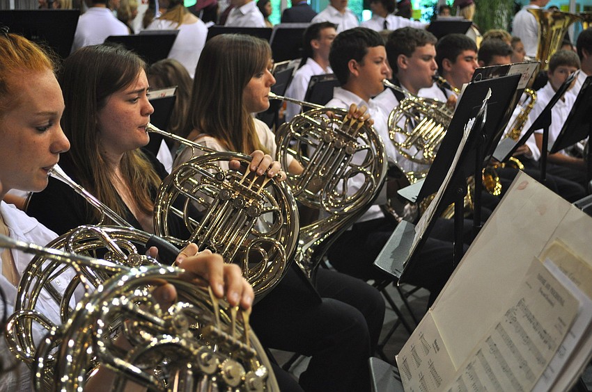 The Riverview High School Marching Band played on as students, families and friends packed into Robarts Arena Saturday to wish RHS's Class of 2011 well.