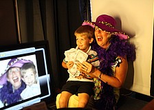Terri Bauer and nephew, Joshua DeCrapio, 5, pose in the Fotos-R-Fun LLC booth at the annual National Cancer Survivors Day celebration Sunday, June 5 at Michael's on East. Bauer has been cancer free for eight years.