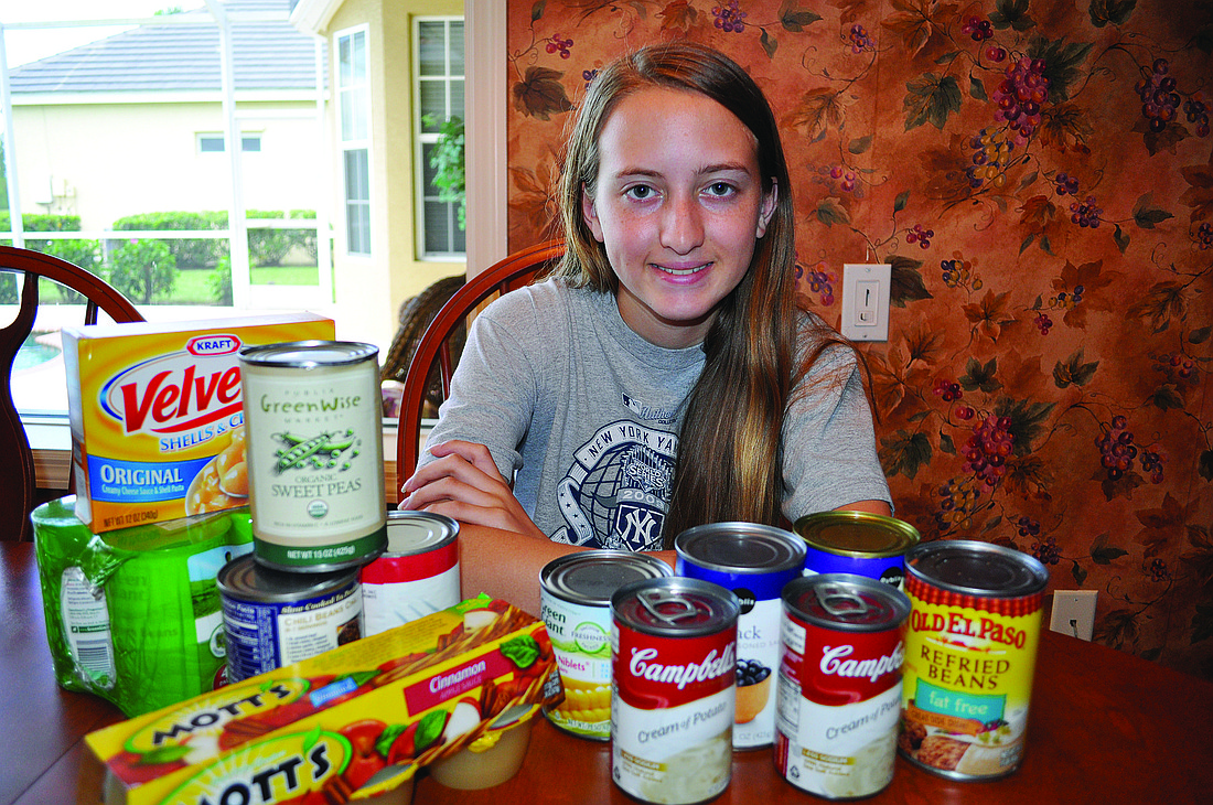 "It opened my eyes that people are out there that really need help," said Can Food Drive organizer Christina Meiser, 15, about seeing homeless people outside the Salvation Army five years ago.