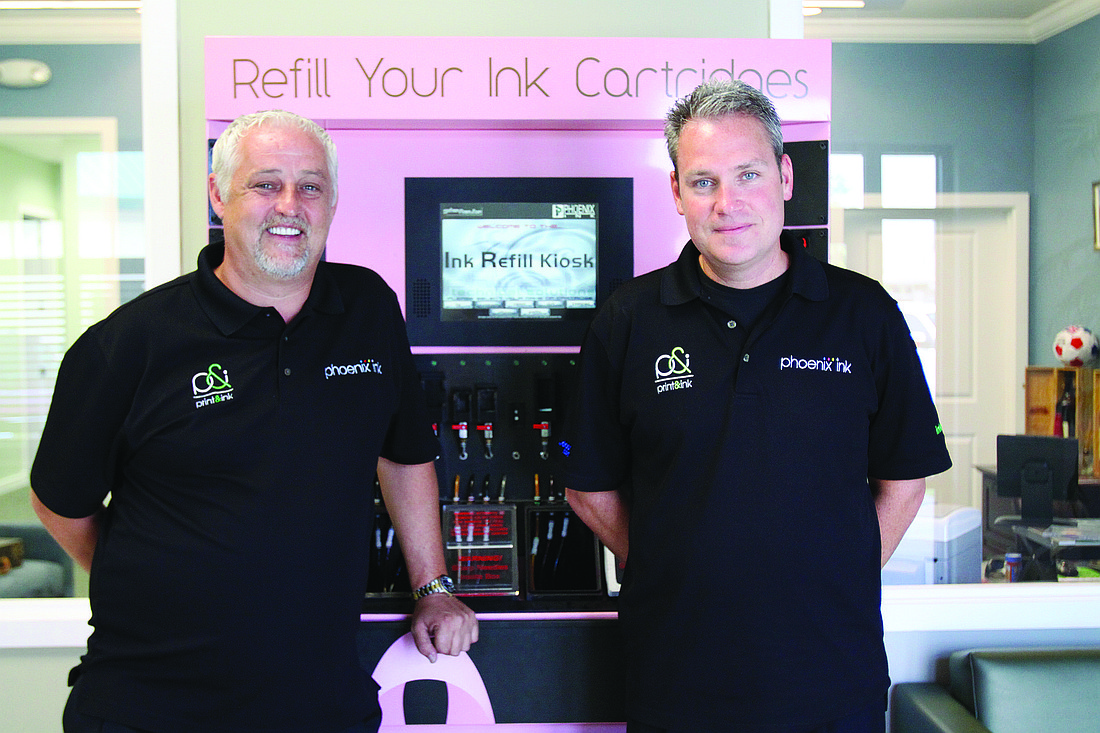 David Scanlon, president of Phoenix Ink, and Ted Helgesen, Phoenix Ink CEO