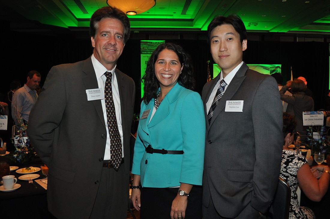 Dave Auker Shumaker, Adria Maria Jensen and Stephen Lee, with Shumaker, Loop and Kendrick, attended the Small Business of the Year awards ceremony June 2, at the Hyatt Regency.