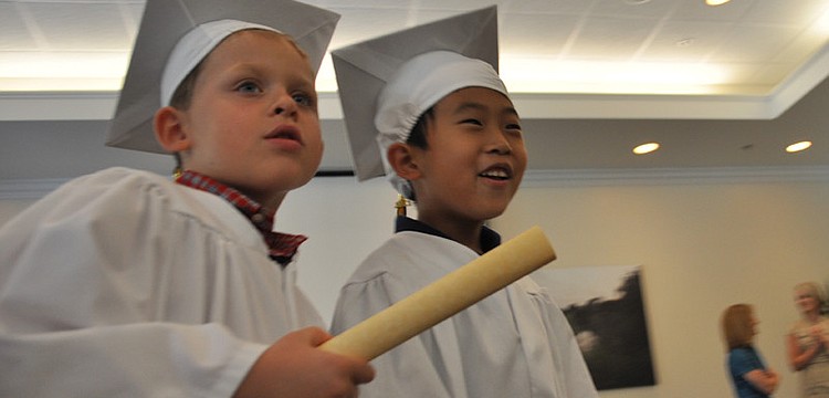 Zachary Szabo and Chris Heo walked out of Town Hall as graduates.