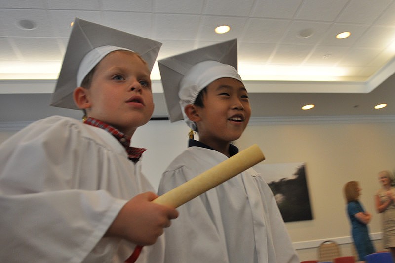 Zachary Szabo and Chris Heo walked out of Town Hall as graduates.