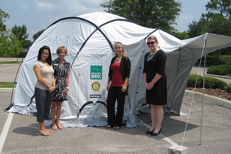 ShelterBox USA today offered East County residents a chance to see an actual ShelterBox. Pictured  are Lisa Palmeri, Carol Edwards and Dena James of the Lakewood Ranch Information Center and Heather Murray of ShelterBox USA.
