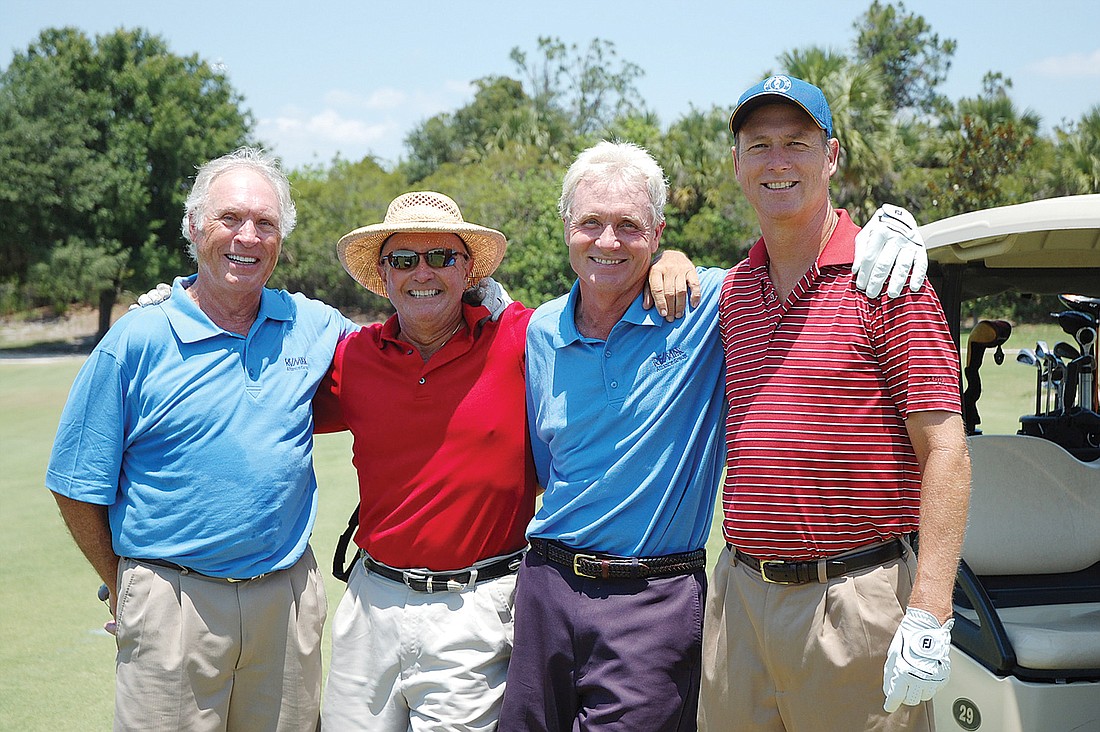 David Coupland, Ernie Lisch, Ron Travis and Richard Parker hit the links at Tara.