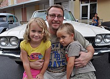 Chris Klein, center, and his children Reese, left, and Chris, right, live in GreyHawk Landing.