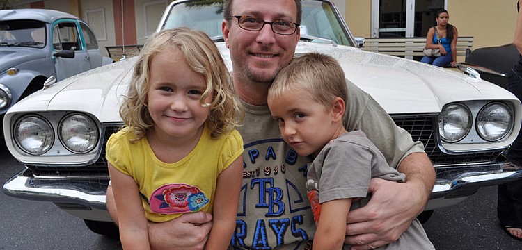 Chris Klein, center, and his children Reese, left, and Chris, right, live in GreyHawk Landing.