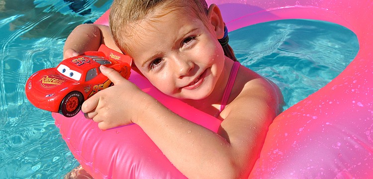 Sienna Steiner cools off in the pool.
