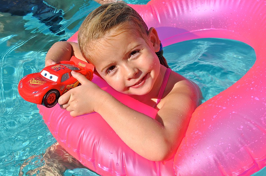 Sienna Steiner cools off in the pool.