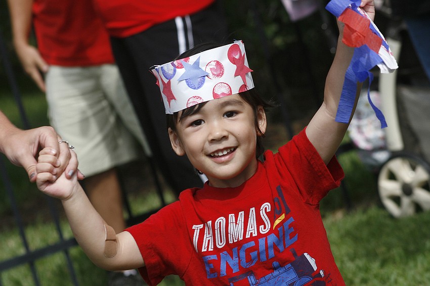 Lyric Eng proudly displayed his art projects during the parade.