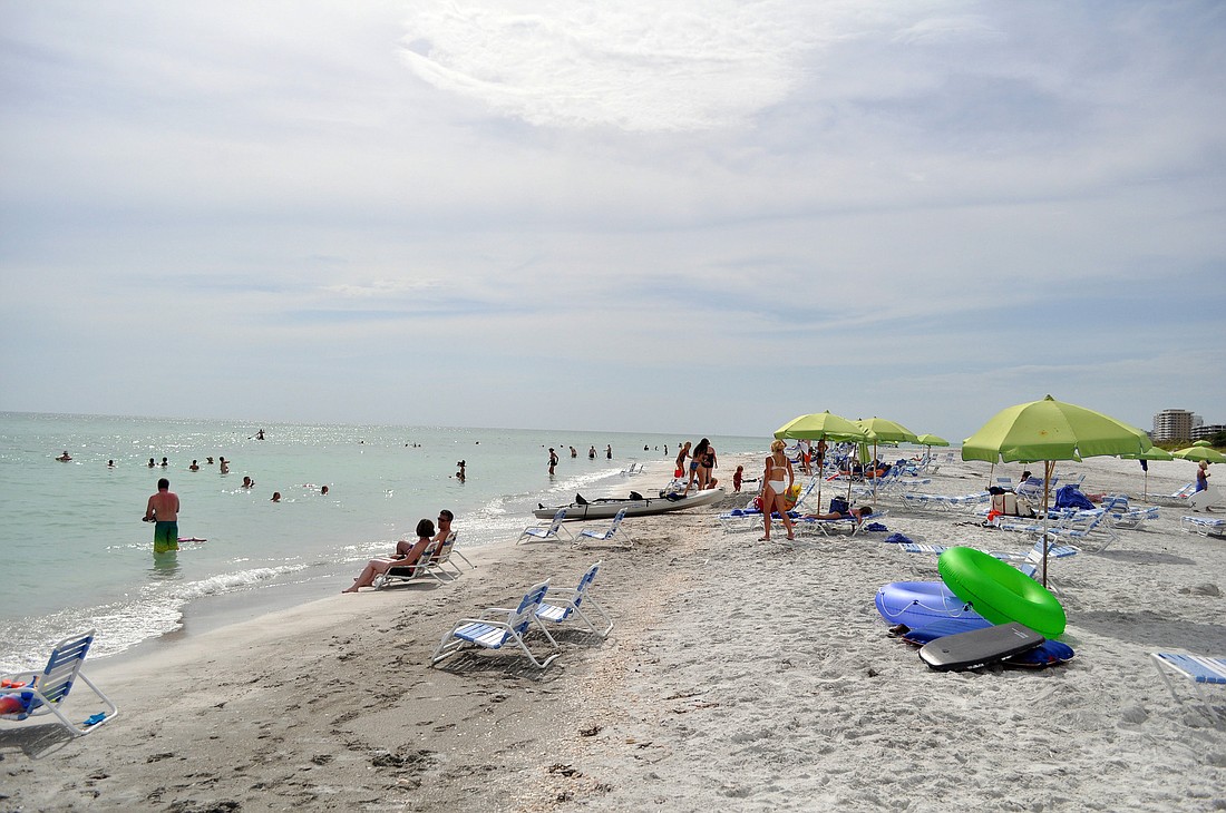 Beachgoers flocked to LongboatÃ¢â‚¬â„¢s beach Sunday, July 3, during the Fourth of July holiday weekend.