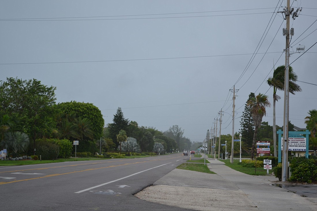 Ominous clouds, rains and wind already are affecting Longboat Key today.