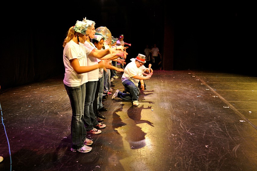 The Players Theatre campers rehearse â€œSchool of Rockâ€ before an audience of summer campers.