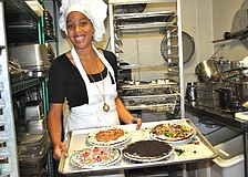 Sierra Hillman shows off a tray of brownies.