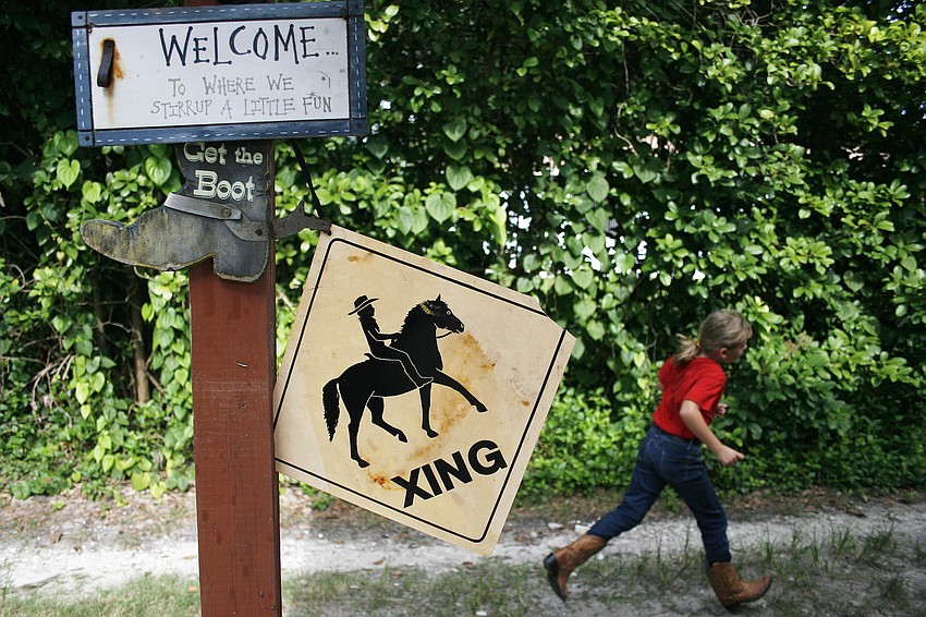 Children learn all aspects of horseback riding and horse care at the camp.
