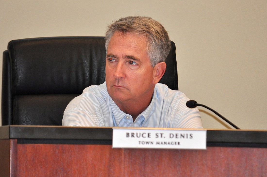 Town Manager Bruce St. Denis eliminated the $265,000 budget shortfall and created a $222 budget surplus.