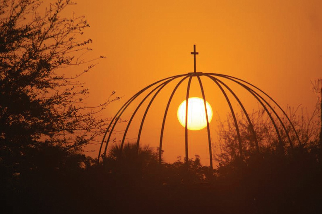 Richard Barnett took this sunrise photo March 21, at Our Lady of the Angels Catholic Church.