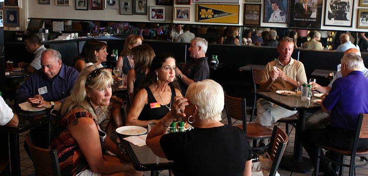 People enjoyed themselves at the Longboat Key Chamber event Thursday, July 21 at the Sports Page.
