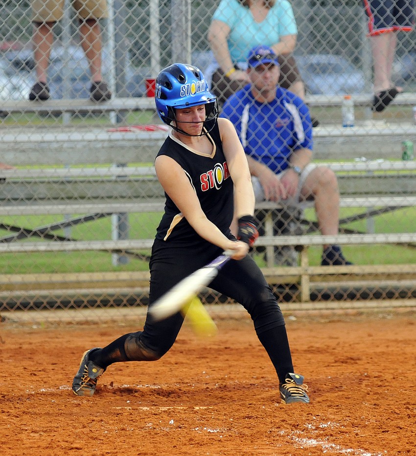 Kirsten Samuels makes contact during the Storm 97 teamâ€™s win over the Sarasota Heat 98 team.