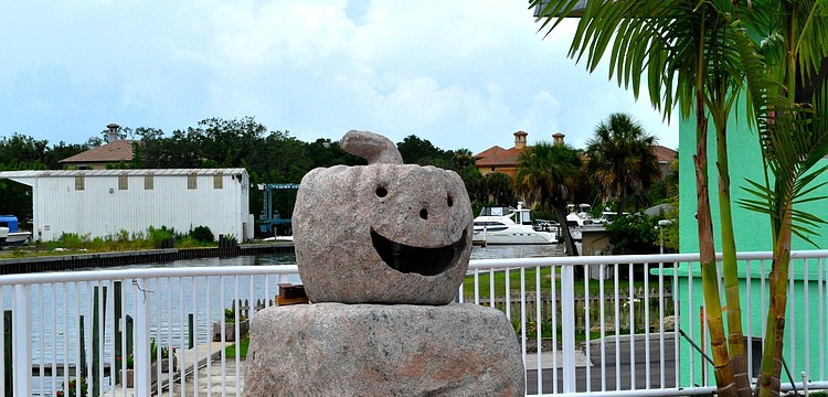 We found a pumpkin sculpture sitting in a parking lot on Tamiami Trail.