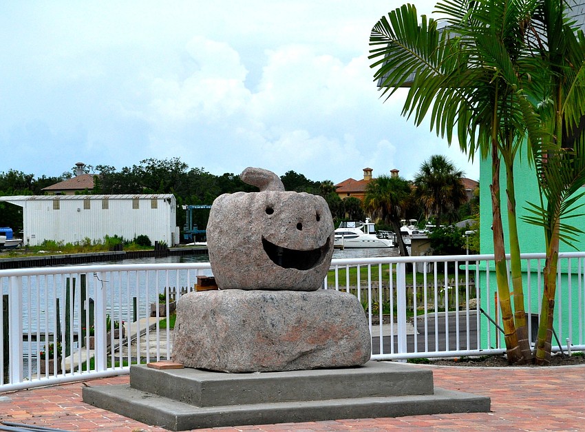 We found a pumpkin sculpture sitting in a parking lot on Tamiami Trail.