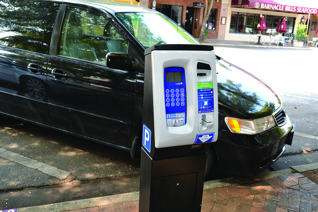The city of Sarasota will move and remove some parking meters by October 1 in an attempt to appease downtown business owners.