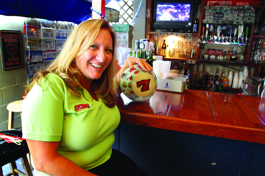 Beth Owen-Cipielewski is dividing her time between the Siesta Key Oyster Bar and preparing for a major bowling tournament.