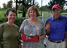 Ellen Bartlett, Pat Kolodgy and Gregg Gamso enjoy themselves Thursday, July 28 during the Alta Vista neighborhood picnic at Payne Park.