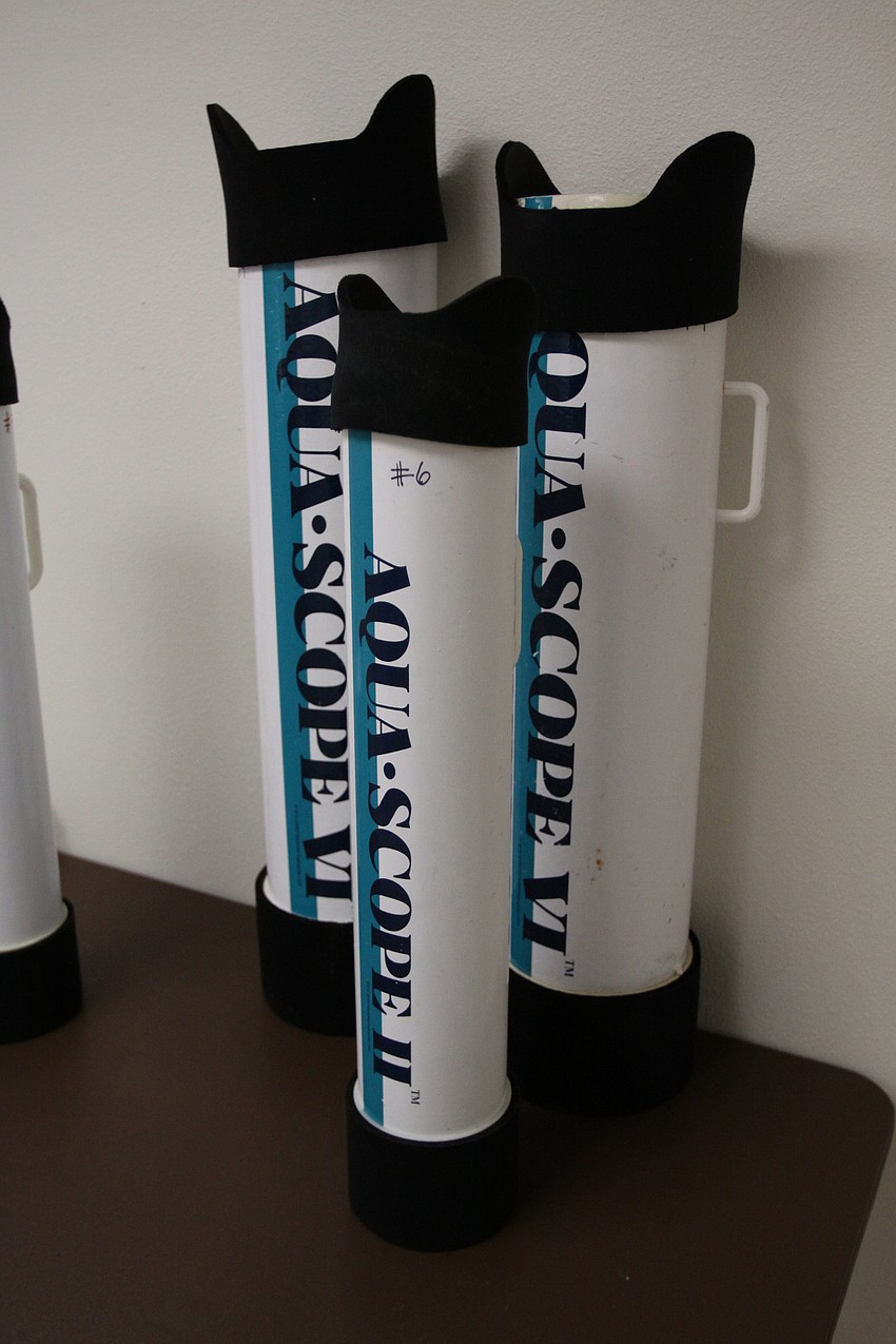 The Aqua-Scopes help volunteers to be able to look at the algae up close, underwater while wading in the water.