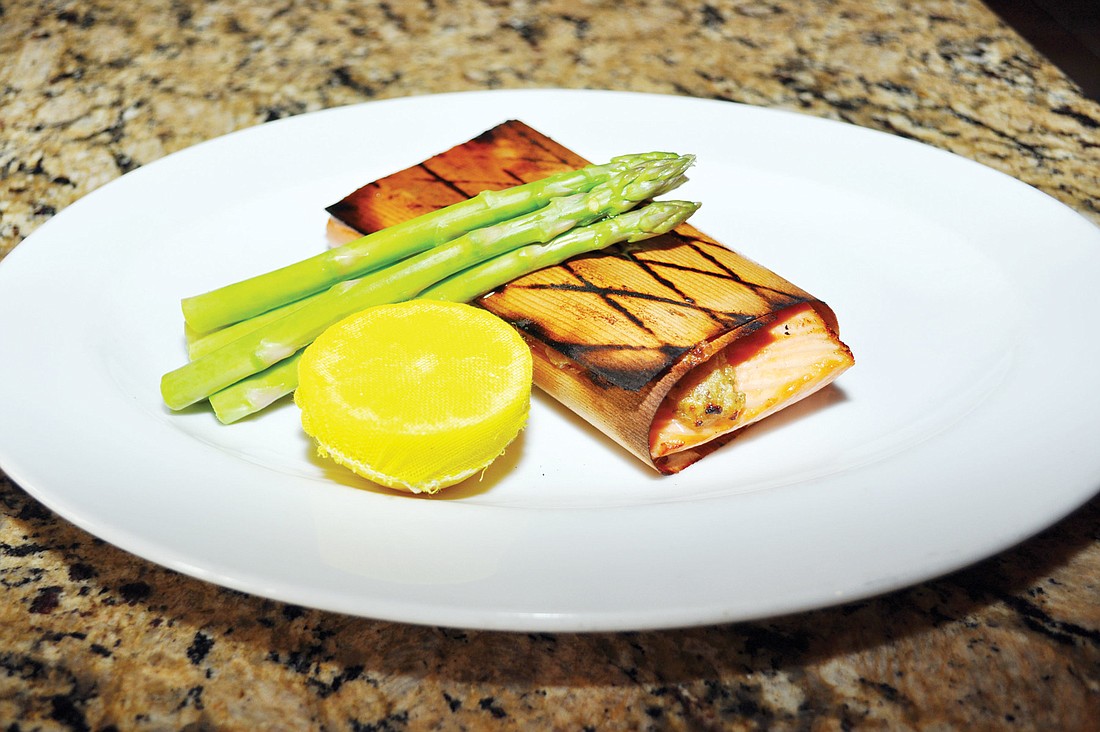 The cedar-wrapped salmon with a maple-Dijon crust is one of Libby's signature dishes.