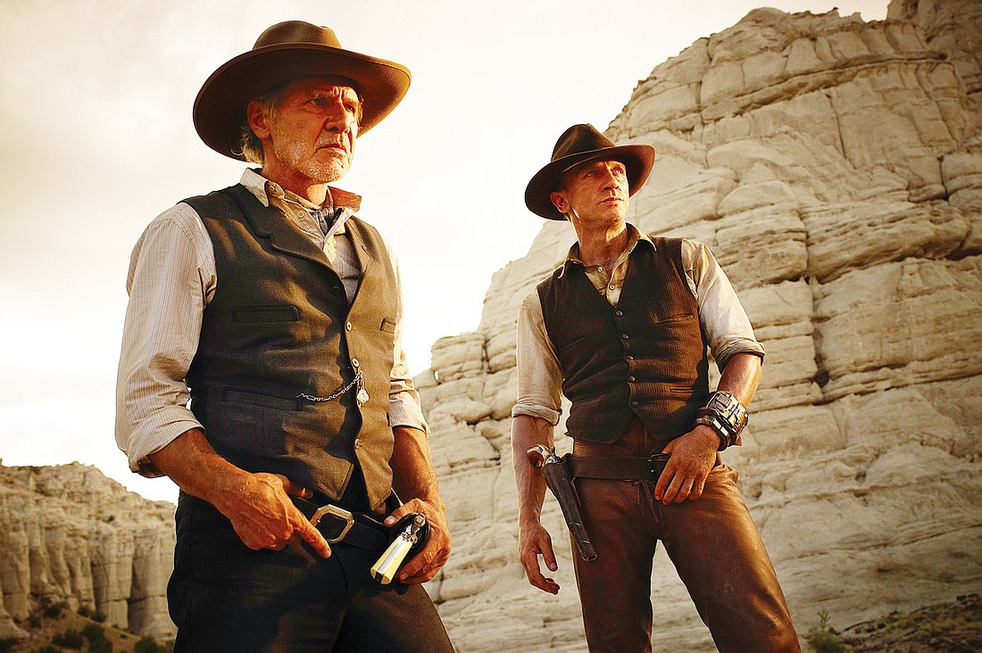 Harrison Ford and Daniel Craig team up to fight the bad guys in the new sci-fi Western, Ã¢â‚¬Å“Cowboys and Aliens.Ã¢â‚¬Â