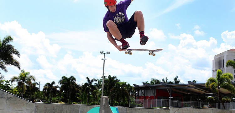 Skyler Munson, 21, gets high above the bowl Tuesday, August 2 at Payne Park's Skate Park.