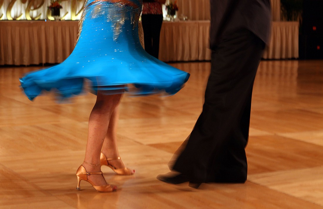 Betty PoireÃ¢â‚¬â„¢s dress spins while dancing with John Moldthan.