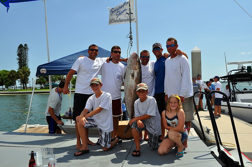 Team Dirt Dragger posed with their 61 lbs. Amberjack Saturday, August 6 during the Sarasota Slam weigh-in at Marina Jackâ€™s.