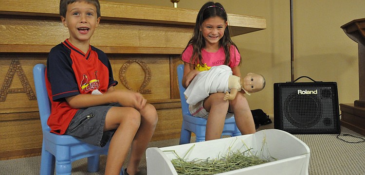 Mason Minor and Giana Talerico played Joseph and Mary during a Bible story.