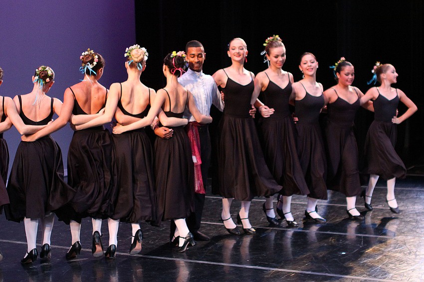 The students joined together to create a spinning fan.