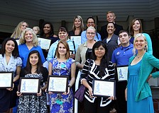 The winners of the Kiwanis academic and technical institute scholarships pose together Thursday, Aug. 18, on the steps by The Grill.