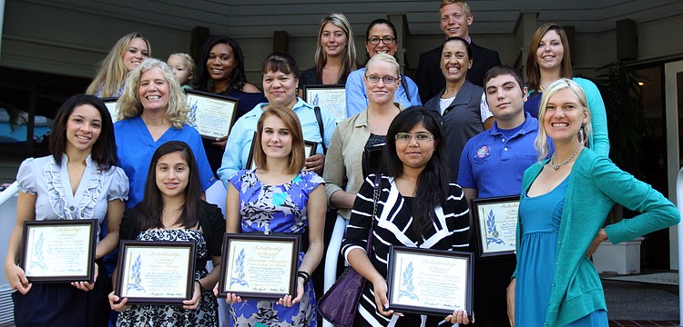The winners of the Kiwanis academic and technical institute scholarships pose together Thursday, Aug. 18, on the steps by The Grill.
